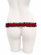 Charger l'image dans la galerie, Black red lace support strap shown from the rear on a display mannequin