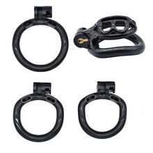 Load image into Gallery viewer, The Teeny Prison Micro Chastity Cage- "Minus Edition" ()