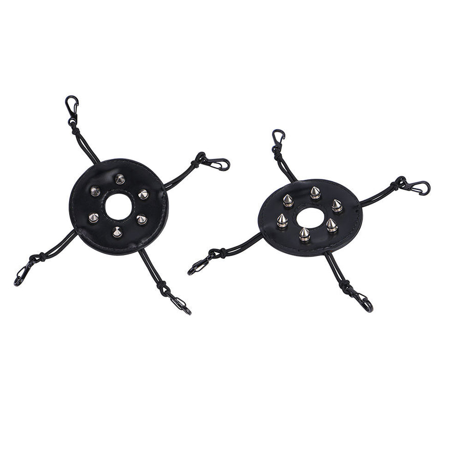 Pair of black riveted covers with four elastic fastening cords