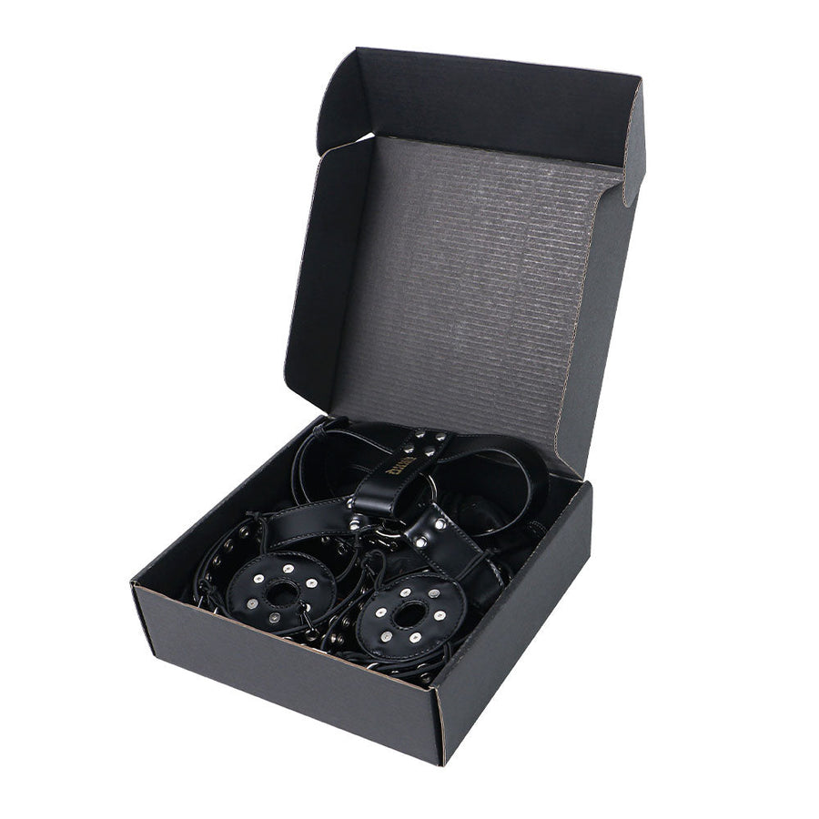 Black harness packed in its black storage box