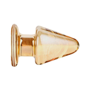 Großer und klobiger Analplug aus goldenem Glas für BDSM