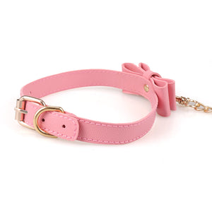 Sissy Sklavenhalsband mit rosa Schleife, BDSM
